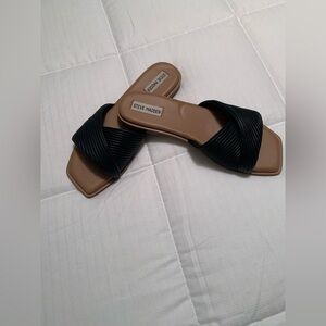 Steve Madden slip-on slides with crisscross black cushion straps